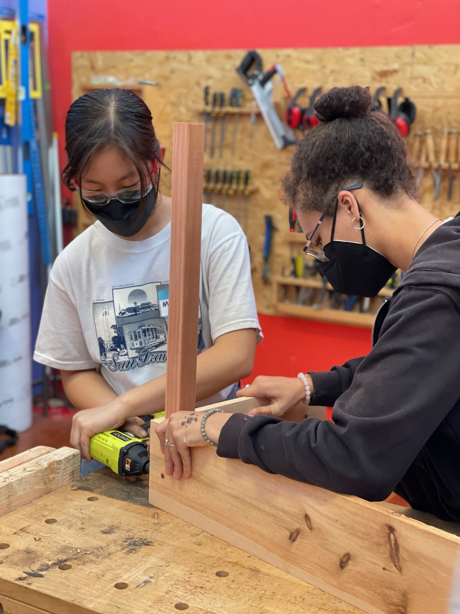 Students working on Adirondack chairs