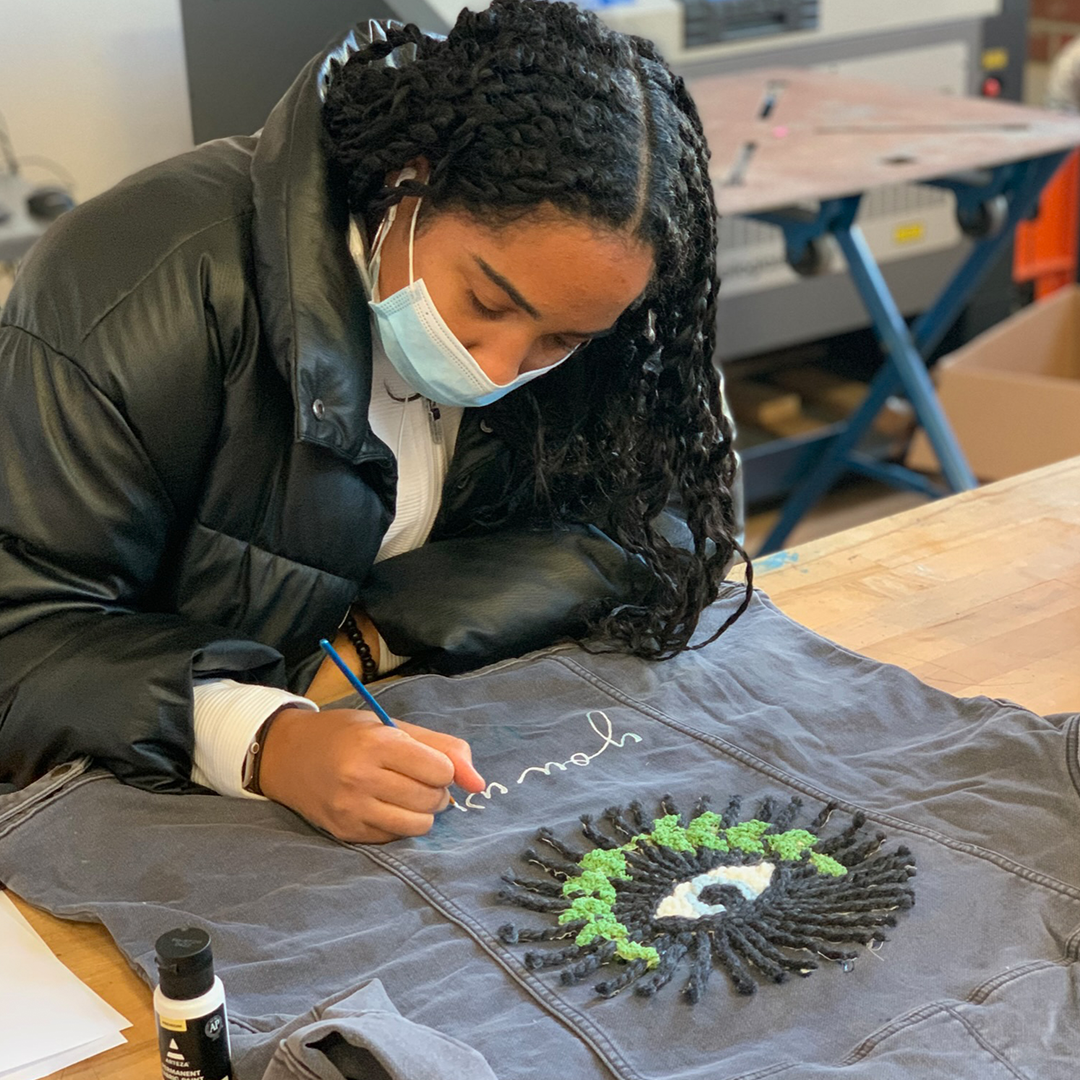 Student working on Girls Garage art project