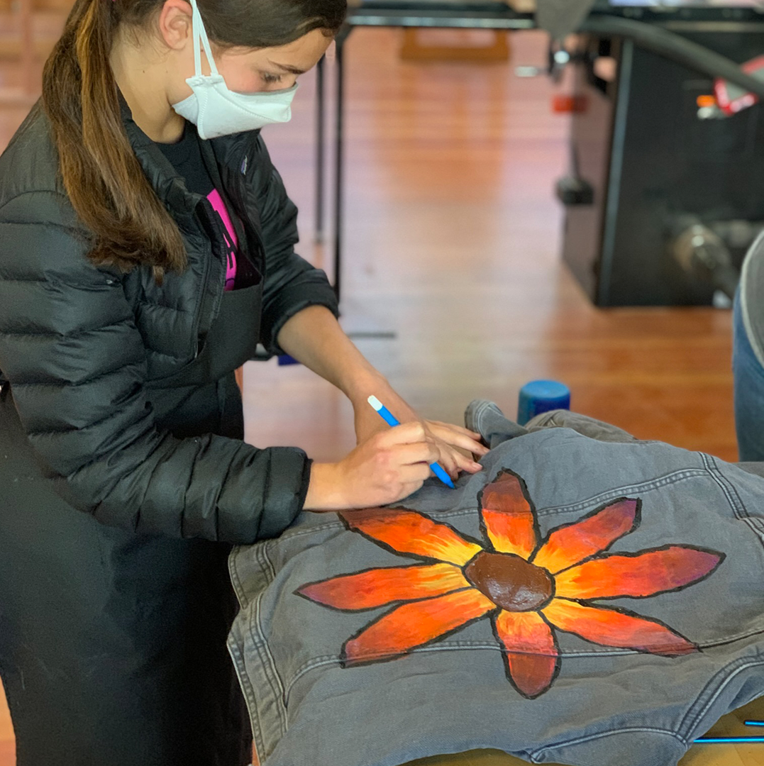 Student painting Dovetail Workwear Jacket
