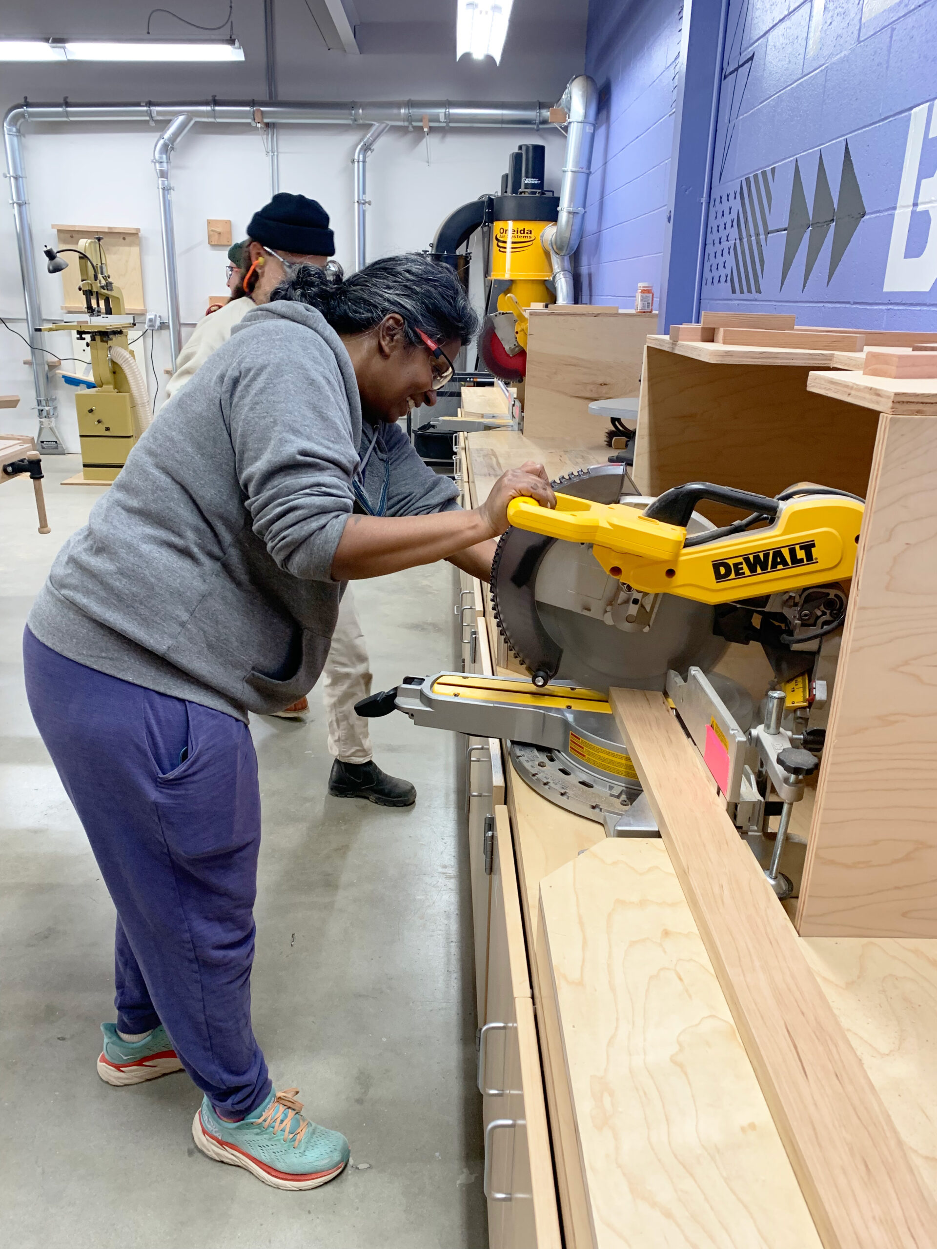 Adult student at miter saw